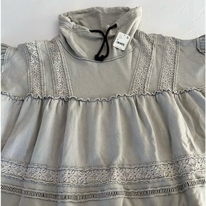 NWT FREE PEOPLE SWEATSHIRT  Light gray, loose. Size small, cowl neck black ties.